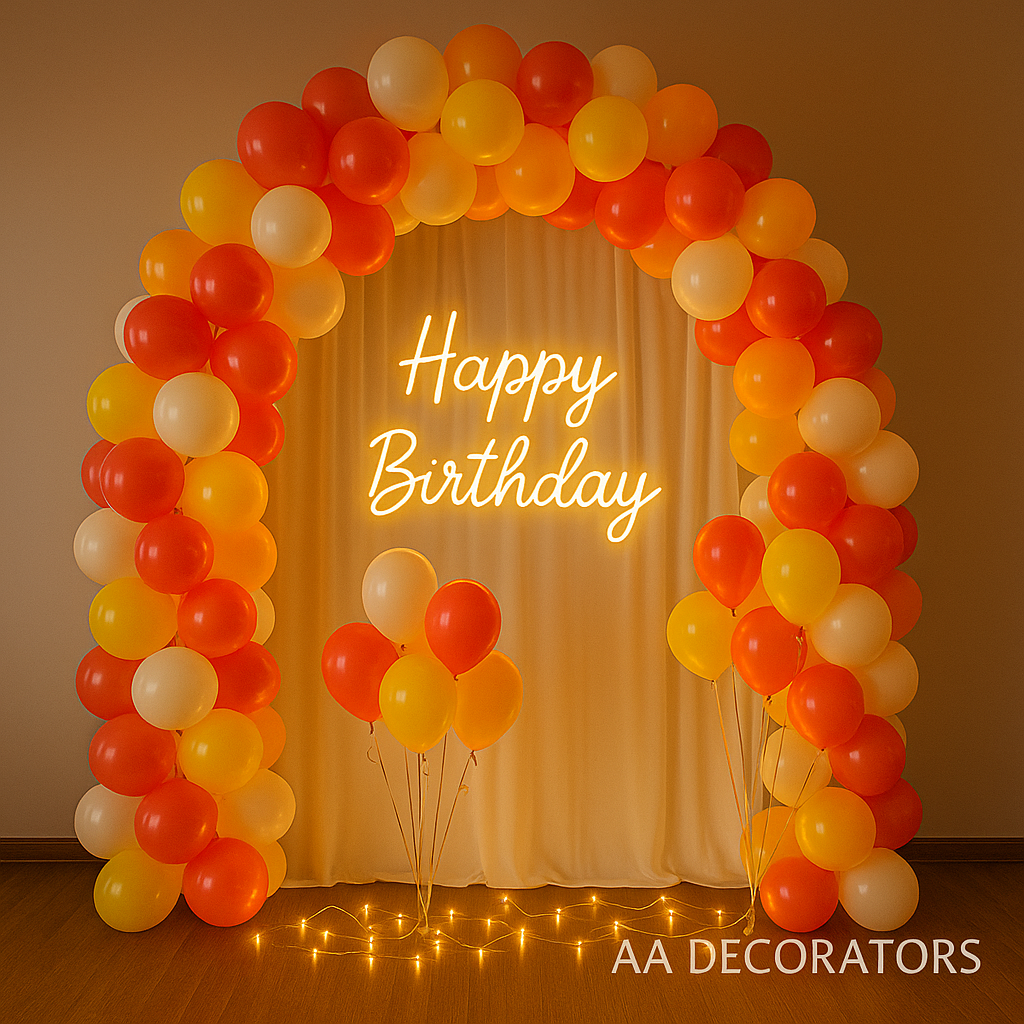 Balloon birthday decoration setup with balloon arch and neon Happy Birthday sign by AA Decorators